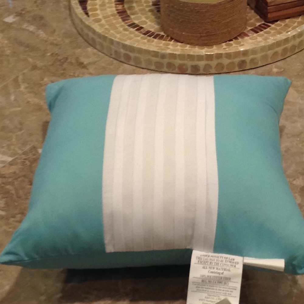 NWOT teal blue accent pillow with white pleats.